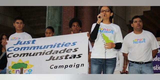 Immigrant advocates say abuses against the Ecuadorian community in Milford, Massachusetts, has spiked. A vigil in November.