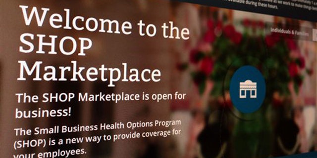 November 27, 2013: This photo shows part of the HealthCare.gov website page featuring information about the SHOP Marketplace is photographed in Washington. (AP Photo/Jon Elswick)