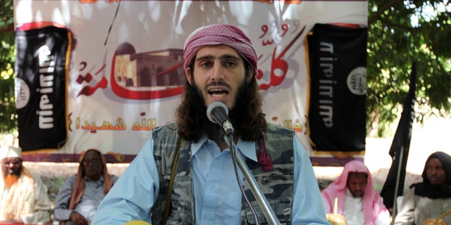 FILE 2011: American-born Islamist militant fighter, Omar Hamami, known as Abu Mansur Al-Amriki, addresses a news conference at a farm in southern Mogadishu's Afgoye district.