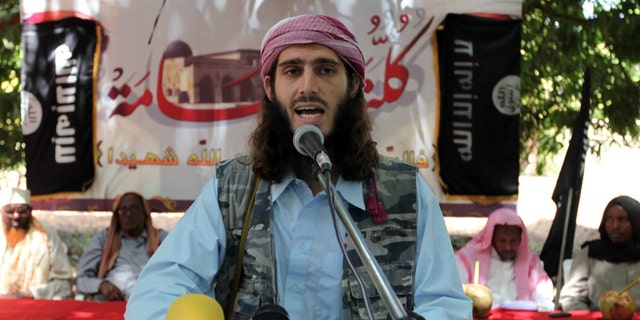 FILE 2011: American-born Islamist militant fighter, Omar Hamami, known as Abu Mansur Al-Amriki, addresses a news conference at a farm in southern Mogadishu's Afgoye district.