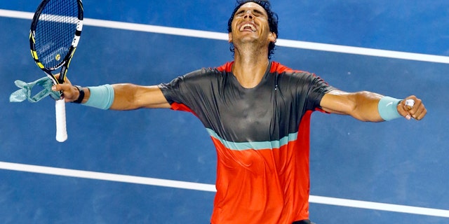 Rafael Nadal celebrates his win over Gael Monfils at the Australian Open in Melbourne, on Jan. 18, 2014.
