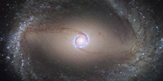 The Hubble Space Telescope was used to capture imagery of spiral galaxy NGC 1512.