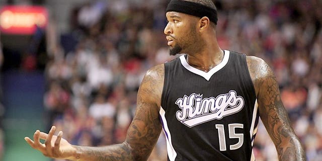 Oct 5, 2014; Vancouver, British Columbia, CAN; Sacramento Kings center DeMarcus Cousins (15) gestures during the first half against the Toronto Raptors at Rogers Arena. Mandatory Credit: Anne-Marie Sorvin-USA TODAY Sports