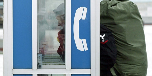 GOOD CALL: Hundreds of old phone booths will become Internet-wired with iPad-like "smart screens."