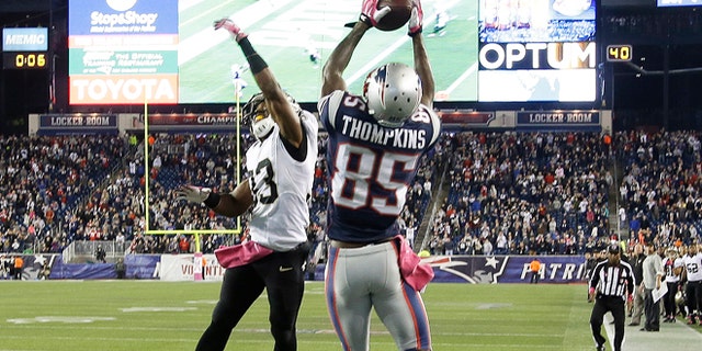 Oct.13, 2013: New England Patriots wide receiver Kenbrell Thompkins (85) catches the winning touchdown pass against New Orleans Saints cornerback Jabari Greer (33) in the fourth quarter in Foxborough, Mass. The Patriots won 30-27.
