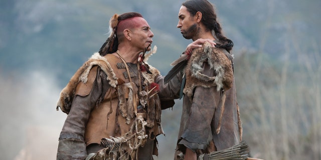 Raoul Trujillo as Massasoit, left, and Tatanka Means as Hobbamock in National Geographic Channelâs two-night movie event âSaints & Strangers,â premiering Nov. 22-23, 9/8c.â¨â¨(photo credit: National Geographic Channels/David Bloomer)