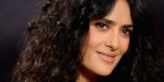 LONDON, ENGLAND - JUNE 01: Co-founder Salma Hayek Pinault poses backstage in the media room at the "Chime For Change: The Sound Of Change Live" Concert at Twickenham Stadium on June 1, 2013 in London, England. Chime For Change is a global campaign for girls' and women's empowerment founded by Gucci with a founding committee comprised of Gucci Creative Director Frida Giannini, Salma Hayek Pinault and Beyonce Knowles-Carter. (Photo by Ian Gavan/Getty Images for Gucci)