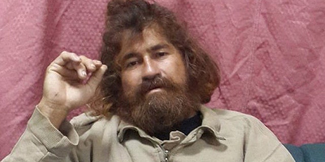 Jose Salvador Alvarenga sits on a couch in Majuro in the Marshall Islands, after he was rescued from being washed ashore on the tiny atoll of Ebon in the Pacific Ocean.