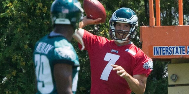 Aug 2, 2015; Philadelphia, PA, USA; Philadelphia Eagles quarterback Sam Bradford (7) throws to running back DeMarco Murray (29) during training camp at NovaCare Complex. Mandatory Credit: Bill Streicher-USA TODAY Sports