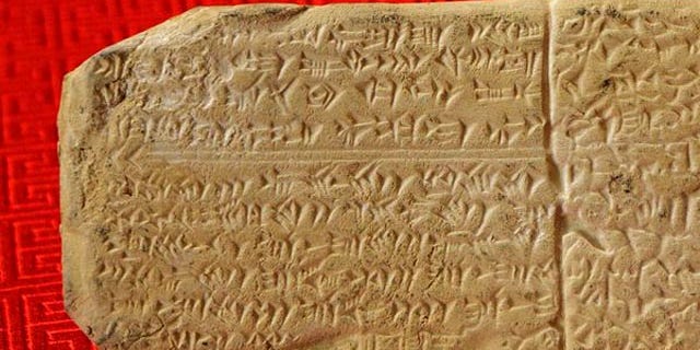 A sample of Ugaritic script on a gift-shop replica.