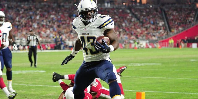 Aug 22, 2015; Glendale, AZ, USA; San Diego Chargers running back Branden Oliver (43) score a touchdown against the Arizona Cardinals during the first half at University of Phoenix Stadium. Mandatory Credit: Matt Kartozian-USA TODAY Sports