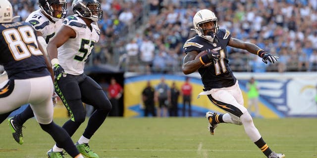 Aug 29, 2015; San Diego, CA, USA; San Diego Chargers wide receiver Steve Johnson (11) runs after making a catch during the second quarter against the Seattle Seahawks at Qualcomm Stadium. Mandatory Credit: Jake Roth-USA TODAY Sports