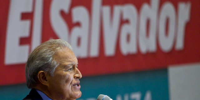 President-elect Salvador Sánchez Céren, of the ruling Farabundo Marti National Liberation Front (FMLN), speaks during a press conference one day after a presidential runoff election in San Salvador, El Salvador, Monday, March 10, 2014. (AP Photo/Esteban Felix)
