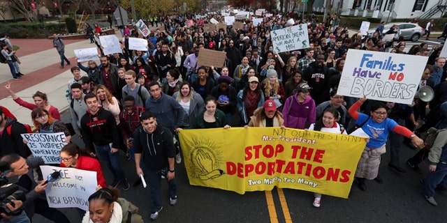 Hundreds of Rutgers University students march last month to protest some of President-elect Donald Trump's proposed policies.
