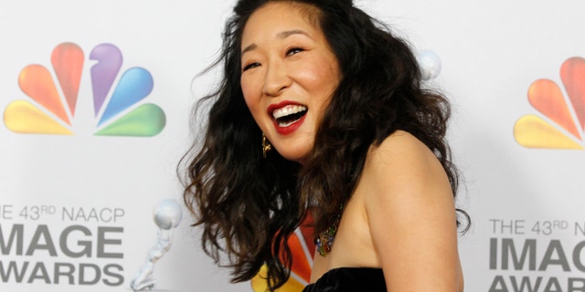 Actress Sandra Oh arrives at the 43rd NAACP Image Awards in Los Angeles, California February 17, 2012.