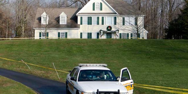 Dec. 18, 2012: A police cruiser sits in the driveway of the home of Nancy Lanza in Newtown, Conn.
