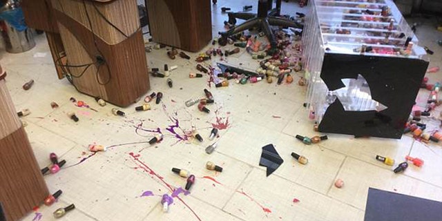 The owner and her staff worked hard after the vandalism to remove the nail polish stains.