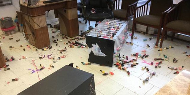 The woman was recorded knocking over a nail polish stand during her rage.