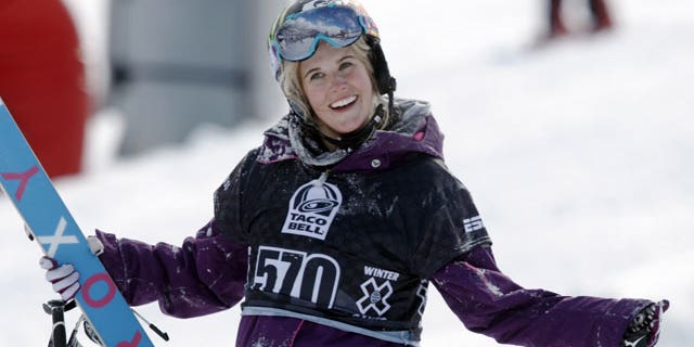 In a Jan. 28, 2010, file photo, Sarah Burke, of Canada, reacts after failing to place in the top-three finishers in the slopestyle skiing women's final at the Winter X Games at Buttermilk Mountain outside Aspen, Colo.