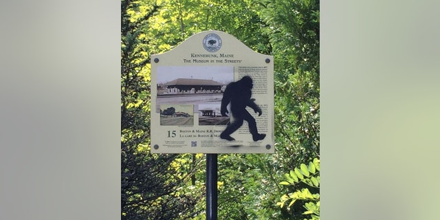 This Aug. 19, 2015 photo provided by the Kennebunk Police Department shows an graffiti on a sign in Kennebunk, Maine. Authorities have nabbed a man who's accused of spray-painting images of Sasquatch on public property in Kennebunk, Maine. Police in the picturesque coastal town didn't find the graffiti featuring Bigfoot all that amusing and charged 36-year-old Freeman Hatch with criminal mischief and possession of drugs. (Det. Stephen M. Borst, Kennebunk Police Department via AP)