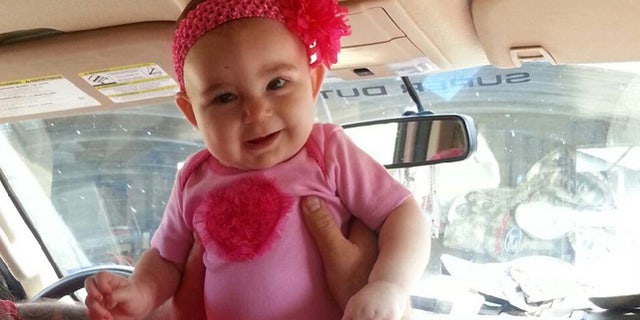 Savannah Snodgrass is seen here after her release from Texas Children's Hospital on Saturday following surgery to remove a life-threatening brain tumor.