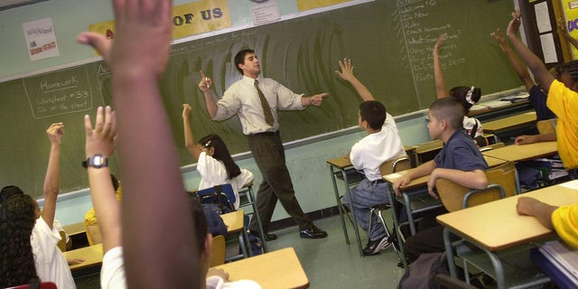 379693 07: Teacher David Nieder of "Knowledge is Power Program" (KIPP) Academy takes questions from his class October 4, 2000 in The Bronx, New York. The Knowledge Is Power Program educates 200 middle-school students, mostly poor black and Latino neighborhood children, housed in a hallway on the fourth floor of a regular Bronx public schooI. Because of strict discipline where each student gets two hours of homework a night and a regular school day runs nine-and-a-half-hours, including Saturdays and throughout the summer, test scores are the highest in the Bronx. Governor George Bush of Texas, where another KIPP school is run, singled out KIPP for praise during his presidential debate against Vice President Al Gore. (Photo by Chris Hondros/Newsmakers)