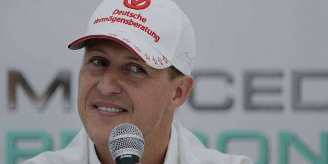 File - Michael Schumacher announces his retirement from Formula One at the end of the 2012 season during a press conference at the Suzuka Circuit venue for the Japanese Formula One Grand Prix in Suzuka, Japan. (AP Photo)