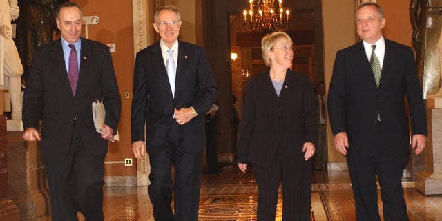 Incoming Senate Majority Leader Harry Reid of Nev., second from left, emerges from a Democratic caucus on Capitol Hill in Washington Tuesday. Nov. 14, 2006, after being elected incoming majority leader of the 110th congress. From left are Sen. Charles Schumer, D-N.Y., elected Democratic Conference vice chair; Reid; Sen. Patty Murray, D-Wash., elected conference secretary, and Sen. Richard Durbin, D-Ill., named assistant majority leader. (AP Photo/Dennis Cook)