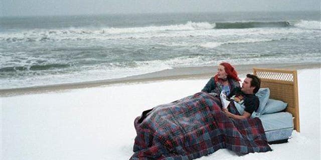 Kate Winslet, left, and Jim Carrey in a scene from the film "Eternal Sunshine of the Spotless Mind."