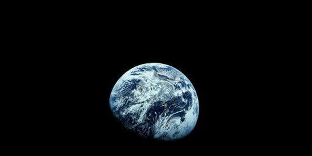 This December 1968 file photo provided by NASA shows Earth as seen from the Apollo 8 spacecraft.