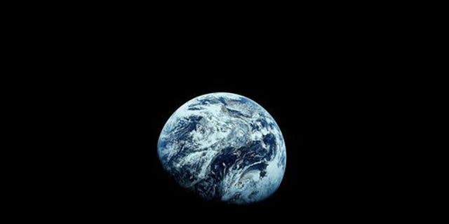 This December 1968 file photo provided by NASA shows Earth as seen from the Apollo 8 spacecraft.
