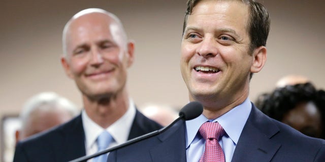 Carlos Lopez-Cantera during a news conference Tuesday, Jan. 14, 2014 in Miami.