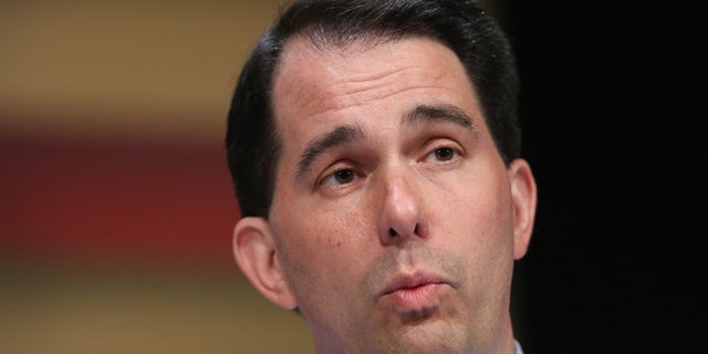 Republican presidential candidate Wisconsin Governor Scott Walker fields questions at The Family Leadership Summit at Stephens Auditorium on July 18, 2015 in Ames, Iowa. (Photo by Scott Olson/Getty Images)