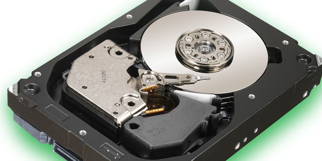 A Seagate Cheetah hard drive is exposed to show its mechanics. Manufacturers are working on an advanced format for hard drives that should boost performance -- just not in Windows XP.