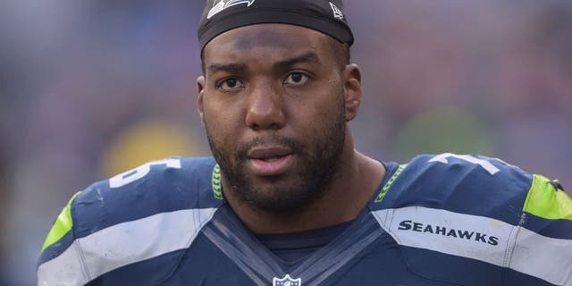 Nov 23, 2014; Seattle, WA, USA; Seattle Seahawks tackle Russell Okung (76) against the Arizona Cardinals at CenturyLink Field. The Seahawks defeated the Cardinals 19-3. Mandatory Credit: Kirby Lee-USA TODAY Sports