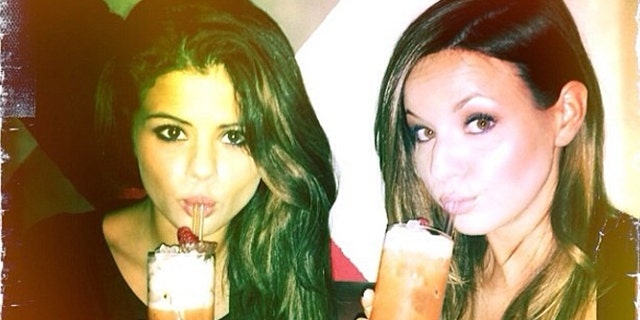 Selena Gomez and a friend are seen drinking just weeks after the singer revealed she went to rehab.