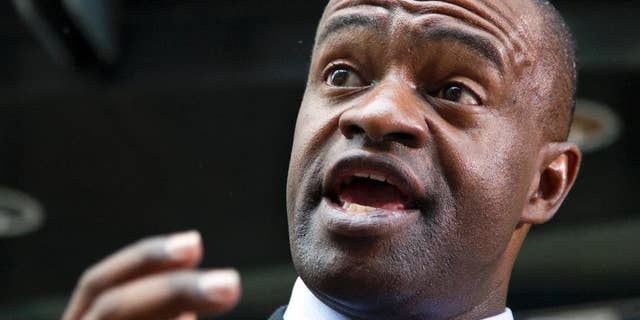 FILE - In this May 24, 2012, file photo, NFL players union chief DeMaurice Smith speaks during a news conference outside their headquarters in Washington. The head of the NFL Players Association says the union is establishing an eight-member commission to advise it about domestic violence prevention and discipline. The head of the NFL Players Association says the union is establishing an eight-member commission to advise it about domestic violence prevention and discipline. In a letter sent Monday, Dec. 1, 2014, to Sen. Jay Rockefeller, the West Virginia Democrat who chairs the Senate Commerce Committee, NFLPA Executive Director DeMaurice Smith writes that "when these matters are left solely to the NFL, the process is mismanaged and often the end result has not been able to withstand outside review." (AP Photo/Carolyn Kaster, File)