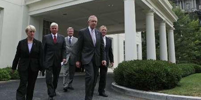 Democratic Senators walk out of the West Wing after meeting with President Barack Obama about healthcare legislation at the White House in Washington, August 4, 2009. (Reuters)
