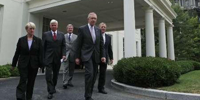 Democratic Senators walk out of the West Wing after meeting with President Barack Obama about healthcare legislation at the White House in Washington, August 4, 2009. (Reuters)