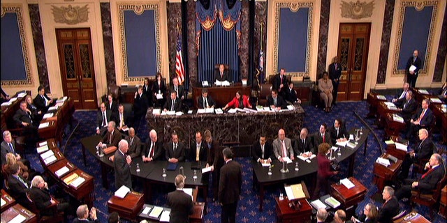 This video frame grab image provided by Senate Television shows the Senate impeachment trial of Judge G. Thomas Porteous, seated, table at right, facing camera, second from left. The attorney Porteous, facing a rare impeachment trial before the Senate argued Tuesday that Congress would be breaking with precedent by considering many of the charges against him. (AP Photo/Senate Television)