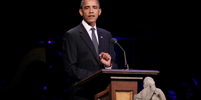 President Barack Obama speaks at 'A Concert for Hope' at the Kennedy Center in Washington.