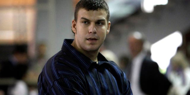 Sept. 13, 2010: Miladin Kovacevic, a former college basketball player charged with beating an American student into a coma, in front of a courtroom in Belgrade, Serbia.