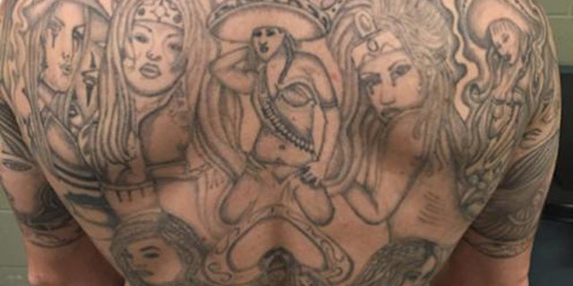 The tattoos on the back of Sergio Amador-Olive. (Photo: U.S. Immigration and Customs Enforcement)