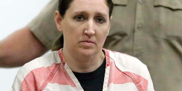 Dec. 8, 2014: Megan Huntsman, who is accused of killing six of her seven newborns and storing all of their bodies in her garage, appears in court in Provo, Utah. (AP)