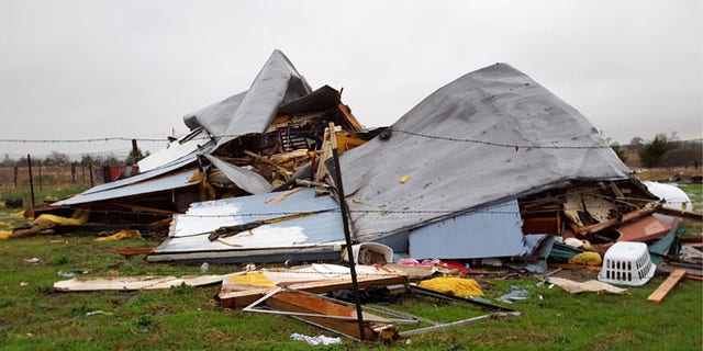 This Sunday, Dec. 27, 2015 photo shows damage to the home where Daniel and Zuleyma Santillano lived with their newborn and three older children in Blue Ridge, Texas, north of Dallas. The Santillano's newborn was killed when the home was destroyed by a tornado Saturday night. (AP Photo/Reese Dunklin) Â