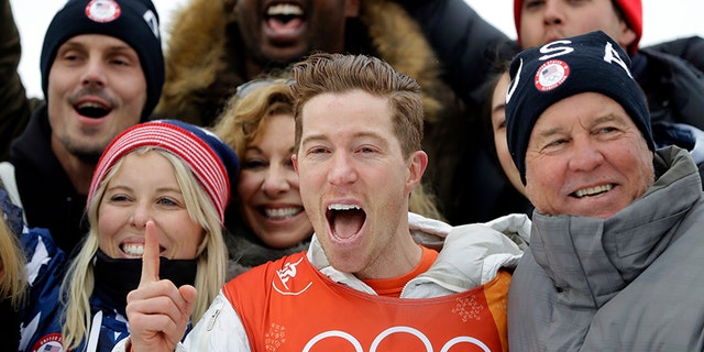 Shaun White, of the United States, celebrates winning gold after the men's halfpipe finals at Phoenix Snow Park at the 2018 Winter Olympics in Pyeongchang, South Korea, Wednesday, Feb. 14, 2018.