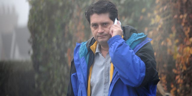 December 1, 2011: Shawn Sullivan,42, on the streets on London where he now lives with wife Sarah Smith, an executive at the Ministry of Justice while avoiding conviction for allegations of three separate cases of sexual assault on minor children in the U.S.