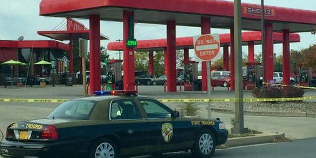 A man was reportedly shot outside a Maryland gas station by a state trooper on Monday.