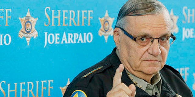 FILE - In this Dec. 18, 2013, file photo, Maricopa County Sheriff Joe Arpaio speaks at a news conference at the Sheriff's headquarters in Phoenix, Ariz. The sheriff of metropolitan Phoenix has raised close to $10 million in his bid for a seventh term, a stunning collection of campaign riches for a local police race. Much of the money contributed to Arpaio was donated by a devoted base of backers who live outside Arizona. (AP Photo/Ross D. Franklin, File)