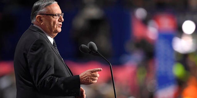 FILE - In this Thursday, July 21, 2016, file photo, Maricopa County, Ariz., Sheriff Joe Arpaio speaks during the final day of the Republican National Convention in Cleveland. Attorneys for Arpaio and his second-in-command are expected to urge a federal judge at a hearing Friday against recommending that prosecutors file a criminal contempt-of-court case against the pair for ignoring court orders in a racial profiling case. (AP Photo/Mark J. Terrill, File)